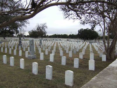 Memorial Ceremony at                       VA National Cemetery with                             Military Honors